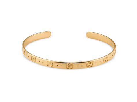 bracciale rigido gucci in oro ovale anni 60|Gucci Bracciale rigido con GG Running in oro giallo.